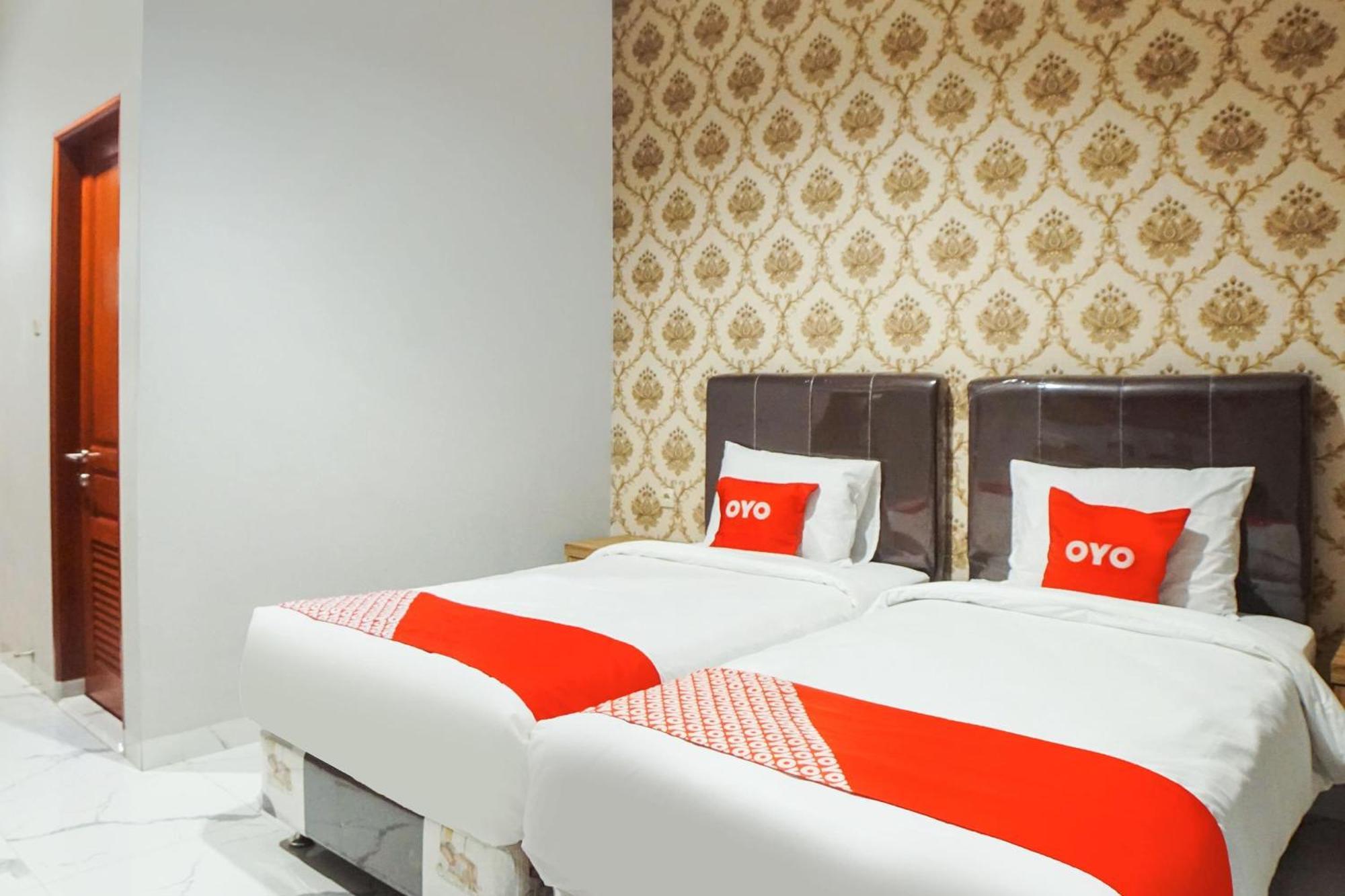 Super Oyo Capital O 92066 Papakoel Hotel & Cafe ميدان المظهر الخارجي الصورة