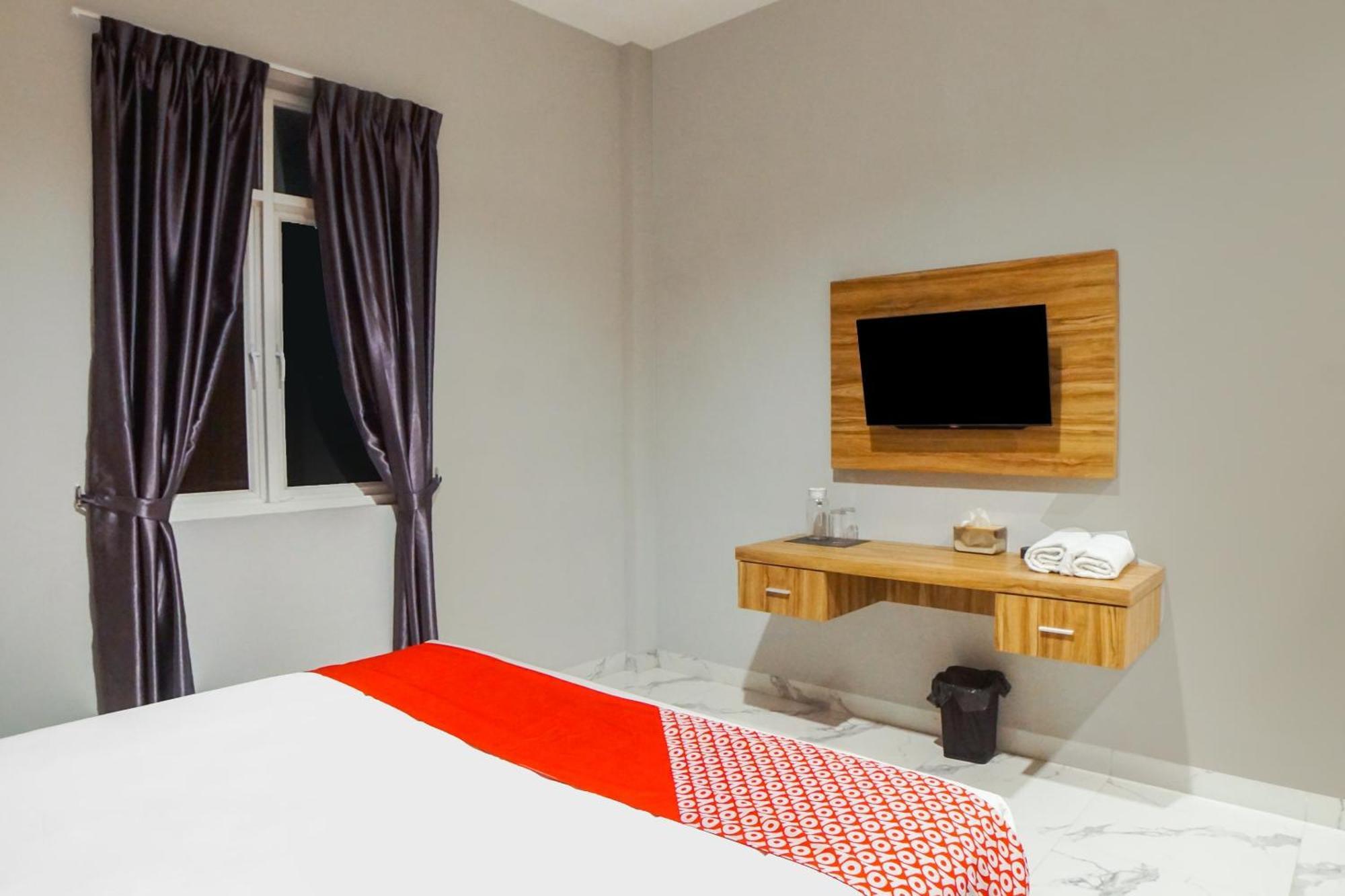 Super Oyo Capital O 92066 Papakoel Hotel & Cafe ميدان المظهر الخارجي الصورة