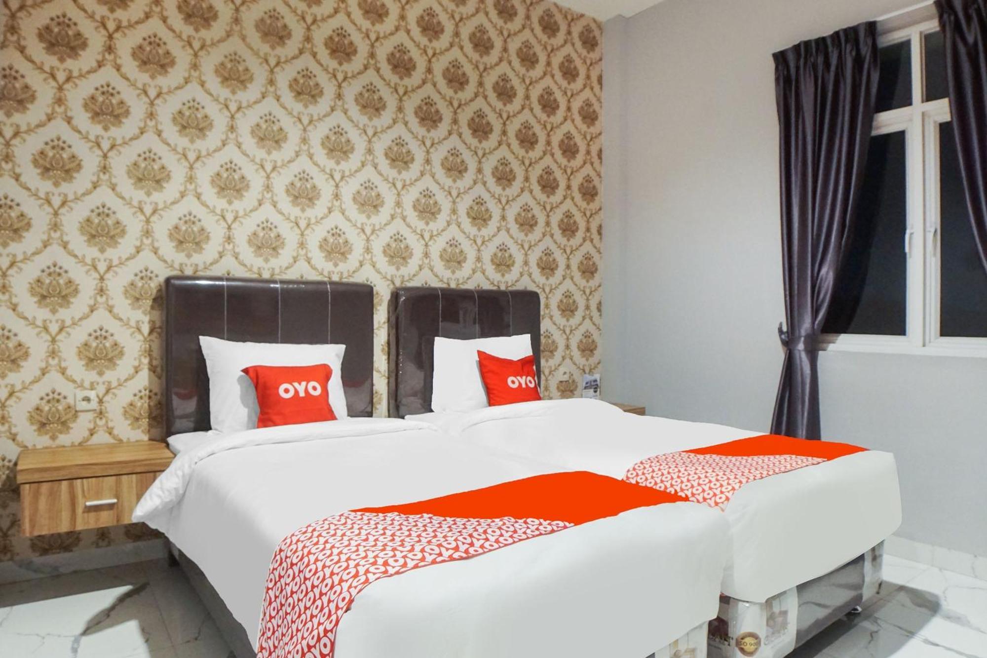 Super Oyo Capital O 92066 Papakoel Hotel & Cafe ميدان المظهر الخارجي الصورة