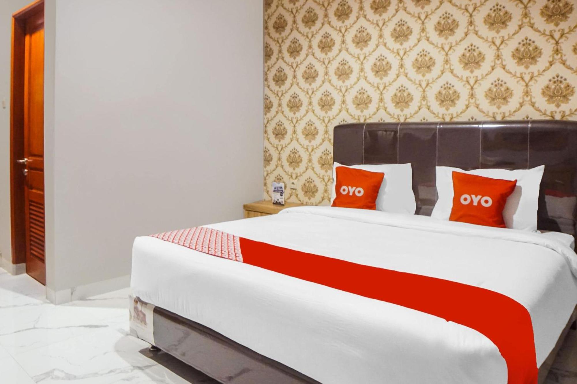 Super Oyo Capital O 92066 Papakoel Hotel & Cafe ميدان المظهر الخارجي الصورة